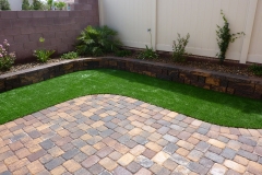 Paver yard with synthetic turf
